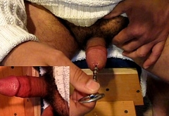 Solo-boy pushing a steel toy down his pee-hole.