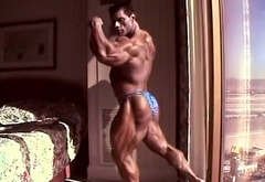 Huge Bodybuilder Flexing in Hotel Room