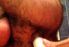 Hairy twink masturbates and cums with a perfume bottle in his ass